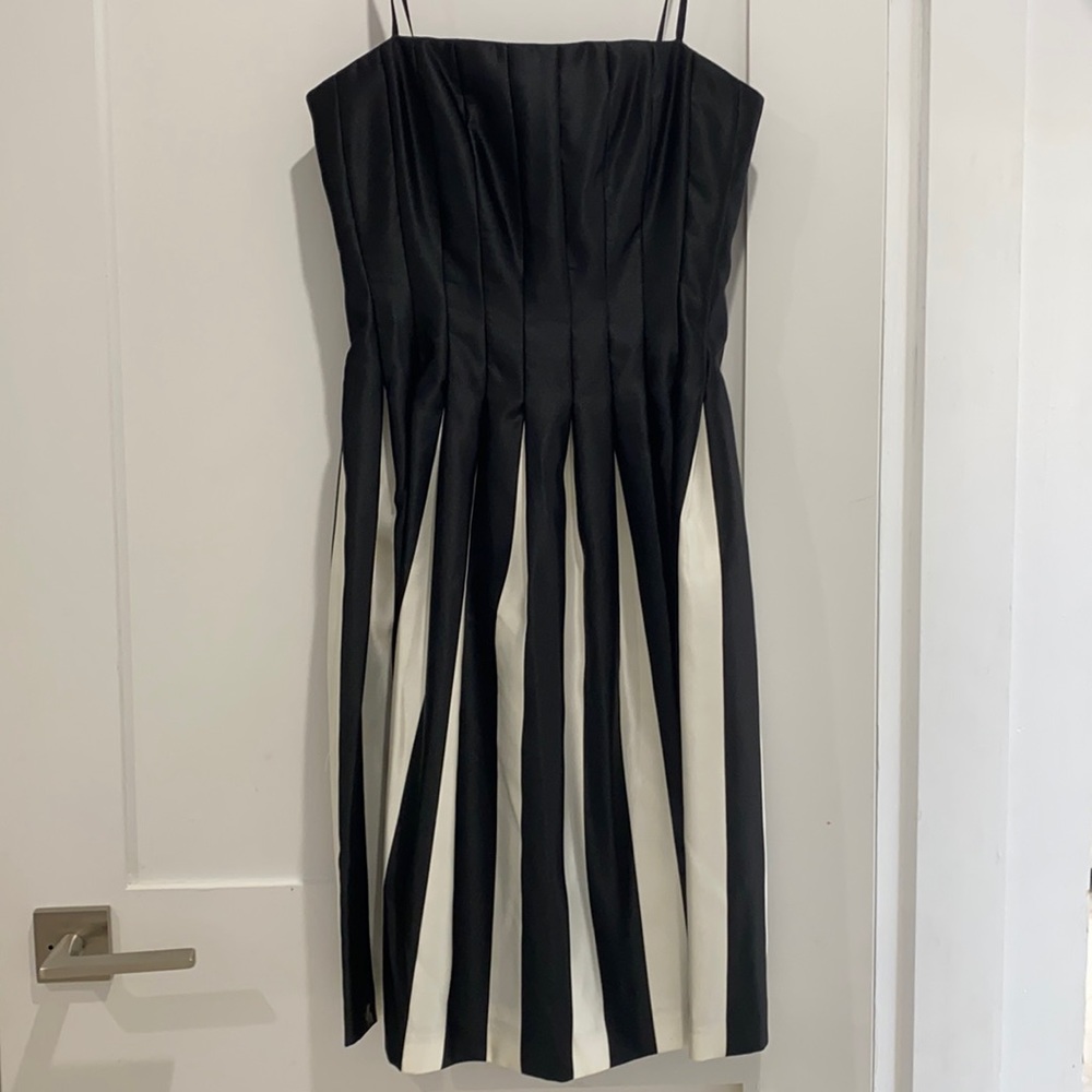 BCBG black and white midi cocktail dress. In perfect condition.